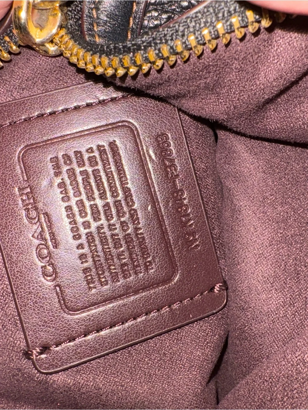 Coach compact pebbled